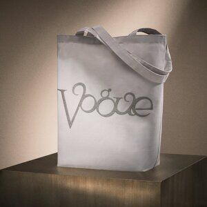 Brand new VOGUE collectible canvas tote with a silver metallic logo